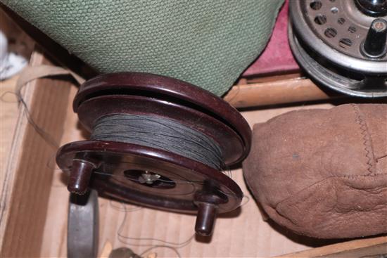 A box of vintage fishing tackle